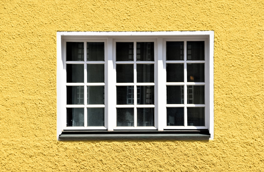 white wooden framed glass window