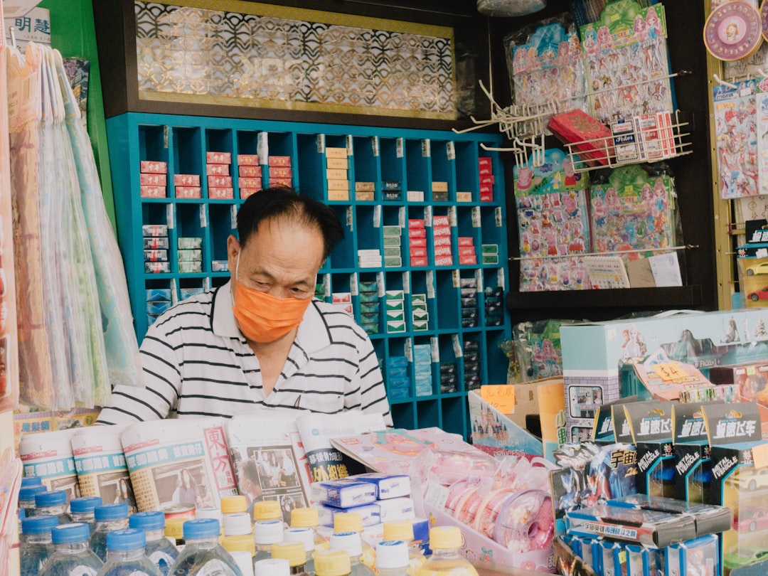 a person sitting at a table with a lot of items on it